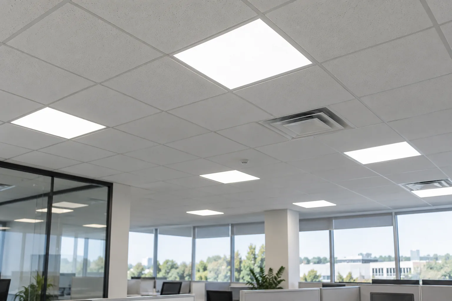 LED panels fitted within a suspended office ceiling grid